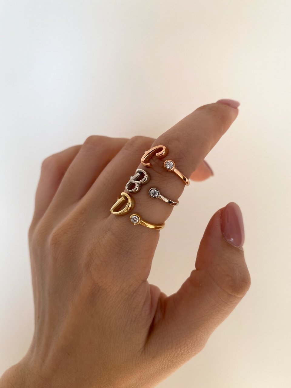 Custom initial ring in 925 sterling silver – accented with delicate stones