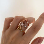 Custom initial ring in 925 sterling silver – accented with delicate stones